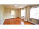 Bedroom featuring hardwood flooring, natural light, and neutral color scheme at 526 N Fairview Rd, Rocky Mount, NC 27801