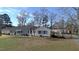 Exterior showcasing the home, yard, fence and beautiful trees at 526 N Fairview Rd, Rocky Mount, NC 27801