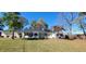 Charming single-story home featuring a well-manicured lawn and mature trees at 526 N Fairview Rd, Rocky Mount, NC 27801