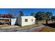 Garage area with a paved driveway and black metal fence at 526 N Fairview Rd, Rocky Mount, NC 27801