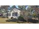 Side view of a home with blue shutters and a manicured yard at 526 N Fairview Rd, Rocky Mount, NC 27801