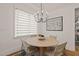 Bright dining area with round table, art, and natural light at 5308 Montclair Dr, Raleigh, NC 27609