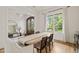 Elegant dining room with hardwood floors and natural light at 5308 Montclair Dr, Raleigh, NC 27609