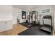 Bright exercise room with state-of-the-art equipment and an adjacent bathroom at 5308 Montclair Dr, Raleigh, NC 27609