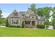 Beautiful two-story home with manicured lawn and mature trees in a desirable neighborhood at 5308 Montclair Dr, Raleigh, NC 27609