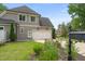 Two-car garage with a well-kept front yard, landscaping, and charming driveway at 5308 Montclair Dr, Raleigh, NC 27609