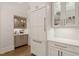 Bright kitchen featuring custom cabinets, a beverage bar, and a built-in refrigerator at 5308 Montclair Dr, Raleigh, NC 27609