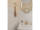 Powder room with ornate mirror and modern faucet at 5308 Montclair Dr, Raleigh, NC 27609