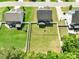 Aerial view of a home showcasing a spacious backyard and fenced perimeter, great for outdoor activities at 5412 Emerald Spring Dr, Knightdale, NC 27545