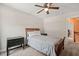 Simple bedroom featuring carpeted floors and a full size bed and black nightstand at 5412 Emerald Spring Dr, Knightdale, NC 27545