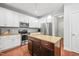 Spacious kitchen with stainless appliances, granite countertops, and a center island at 5412 Emerald Spring Dr, Knightdale, NC 27545