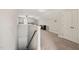Spacious loft area with neutral carpeting, white walls, and natural light at 5412 Emerald Spring Dr, Knightdale, NC 27545
