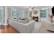 Inviting living room features a cozy fireplace, modern furnishings, and built-in bookshelves at 5521 Erinvale Ct, Holly Springs, NC 27540