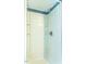 All-white tile shower at 5625 Church Rd, Graham, NC 27253