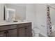 Modern bathroom with double sink vanity and shower-tub combo at 60 Bold Dr, Youngsville, NC 27596