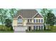 Charming two-story home with a neutral color palette, complemented by a gable roof and a convenient two-car garage at 60 Bold Dr, Youngsville, NC 27596