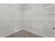 Walk-in closet featuring sturdy shelving and ample space for organization and storage at 60 Bold Dr, Youngsville, NC 27596
