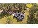 A home with a multi-gabled roof has a large lawn with mature trees at 620 Richardson Rd, Zebulon, NC 27597