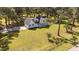 Aerial view of a beautiful home on a large lot surrounded by mature trees at 620 Richardson Rd, Zebulon, NC 27597