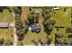 Overhead view showcasing the home's location, surrounded by mature trees and expansive lawns at 620 Richardson Rd, Zebulon, NC 27597