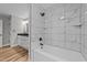 Modern bathroom featuring a tile shower and black fixtures at 620 Richardson Rd, Zebulon, NC 27597