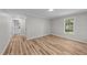 Bedroom with wood flooring and natural light at 620 Richardson Rd, Zebulon, NC 27597