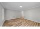 Bedroom featuring wood flooring and a neutral color scheme at 620 Richardson Rd, Zebulon, NC 27597
