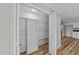 Open closet with built-in shelving in a freshly painted home with wood floors at 620 Richardson Rd, Zebulon, NC 27597