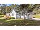 A light blue home with a large two-car garage and a back deck at 620 Richardson Rd, Zebulon, NC 27597