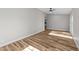 Living room with wood floors, natural light, and ample space at 620 Richardson Rd, Zebulon, NC 27597