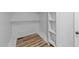 Walk-in closet with built-in shelves and ample storage space at 620 Richardson Rd, Zebulon, NC 27597
