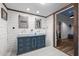Bright bathroom featuring double sink vanity and rustic framed mirrors at 6447 Beulah Church Rd, Liberty, NC 27298
