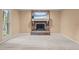 Cozy living room featuring a brick fireplace and neutral wall paint at 6925 Valley Lake Dr, Raleigh, NC 27612