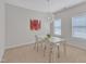 Bright dining area with a modern light fixture and ample natural light at 711 Keystone Park Dr # 7, Morrisville, NC 27560
