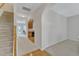 Inviting hallway showcasing the staircase and an archway to the adjacent kitchen at 711 Keystone Park Dr # 7, Morrisville, NC 27560