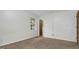 Cozy bedroom with neutral carpet, fresh paint, and plenty of natural light at 713 Marlboro Pl, Rocky Mount, NC 27801