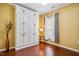 Bedroom with Murphy bed cabinet and a decorative vase at 740 Blackfriars Loop, Cary, NC 27519
