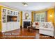Gathering Room Gas fireplace and built-in surround sound speakers at 740 Blackfriars Loop, Cary, NC 27519