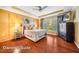 Owner's Suite with tray ceiling, hardwood floors and large windows at 740 Blackfriars Loop, Cary, NC 27519