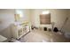 Eat-in kitchen featuring custom cabinets and large windows at 752 Nashville Rd, Rocky Mount, NC 27803