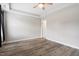 Bright bedroom with hardwood flooring, ceiling fan, and plenty of natural light at 852 Cokesbury Park Lane Ln, Fuquay Varina, NC 27526