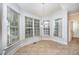 Bright breakfast nook with large windows, perfect for enjoying morning coffee at 8840 Woodyhill Rd, Raleigh, NC 27613