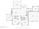 Detailed first-floor plan showcasing spacious living areas, including living room, kitchen, garage, and study at 8840 Woodyhill Rd, Raleigh, NC 27613