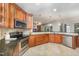 Well-equipped kitchen featuring modern appliances and ample counter space at 8840 Woodyhill Rd, Raleigh, NC 27613