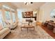 Bright living room with hardwood floors and stylish furnishings at 8840 Woodyhill Rd, Raleigh, NC 27613