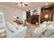 Inviting living room with a fireplace, built-in shelves, and natural light at 8840 Woodyhill Rd, Raleigh, NC 27613