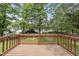 Wooden deck offers a spot for outdoor enjoyment, overlooking the backyard at 9212 Sayornis Ct, Raleigh, NC 27615