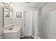 Bright full bathroom with vanity, updated fixtures, and a shower and tub combo at 9212 Sayornis Ct, Raleigh, NC 27615