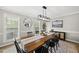 Beautiful dining room with natural light, stylish decor, and a spacious layout at 9212 Sayornis Ct, Raleigh, NC 27615