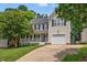 Lovely two-story home with a welcoming front porch and attached garage at 9212 Sayornis Ct, Raleigh, NC 27615